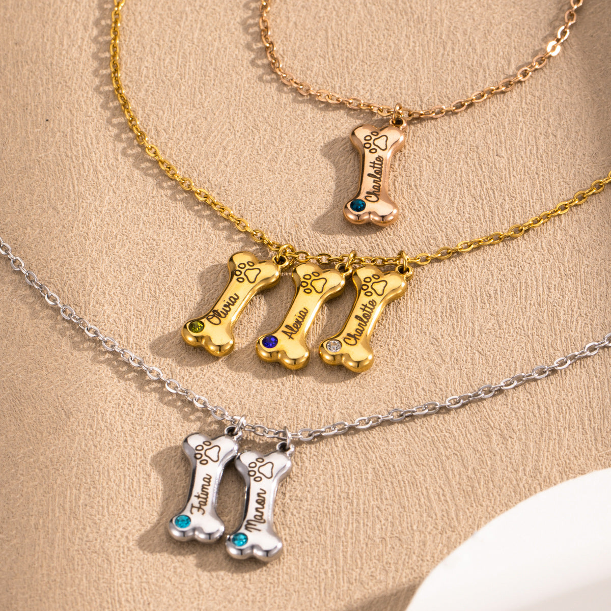 ART FUREVER custom pet jewelry - personalized engraved silver bone shaped necklace - pet name charm and minimalistic design