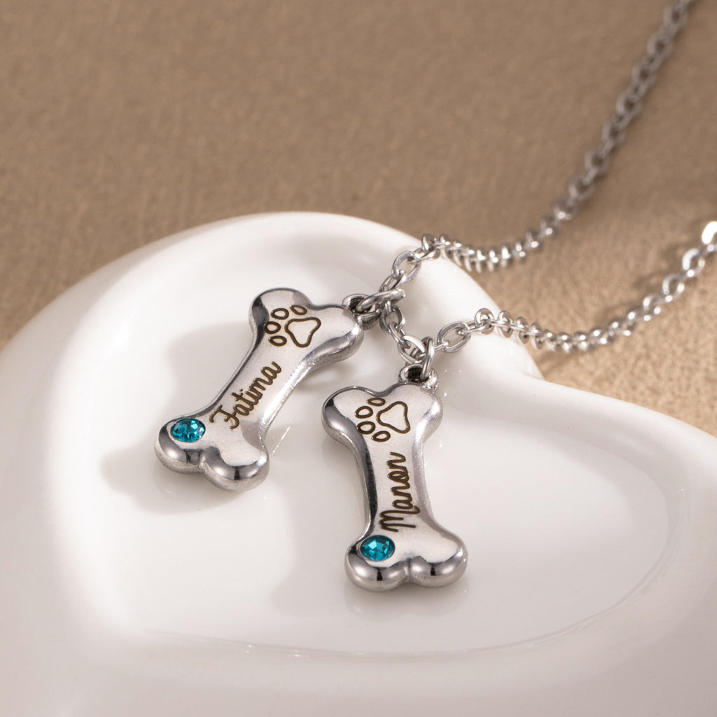 ART FUREVER custom pet jewelry - personalized engraved silver bone shaped necklace - pet name charm and minimalistic design